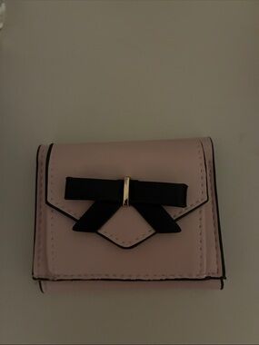 Claire's Light Pink Wallet with Black Bow and Gold Accent